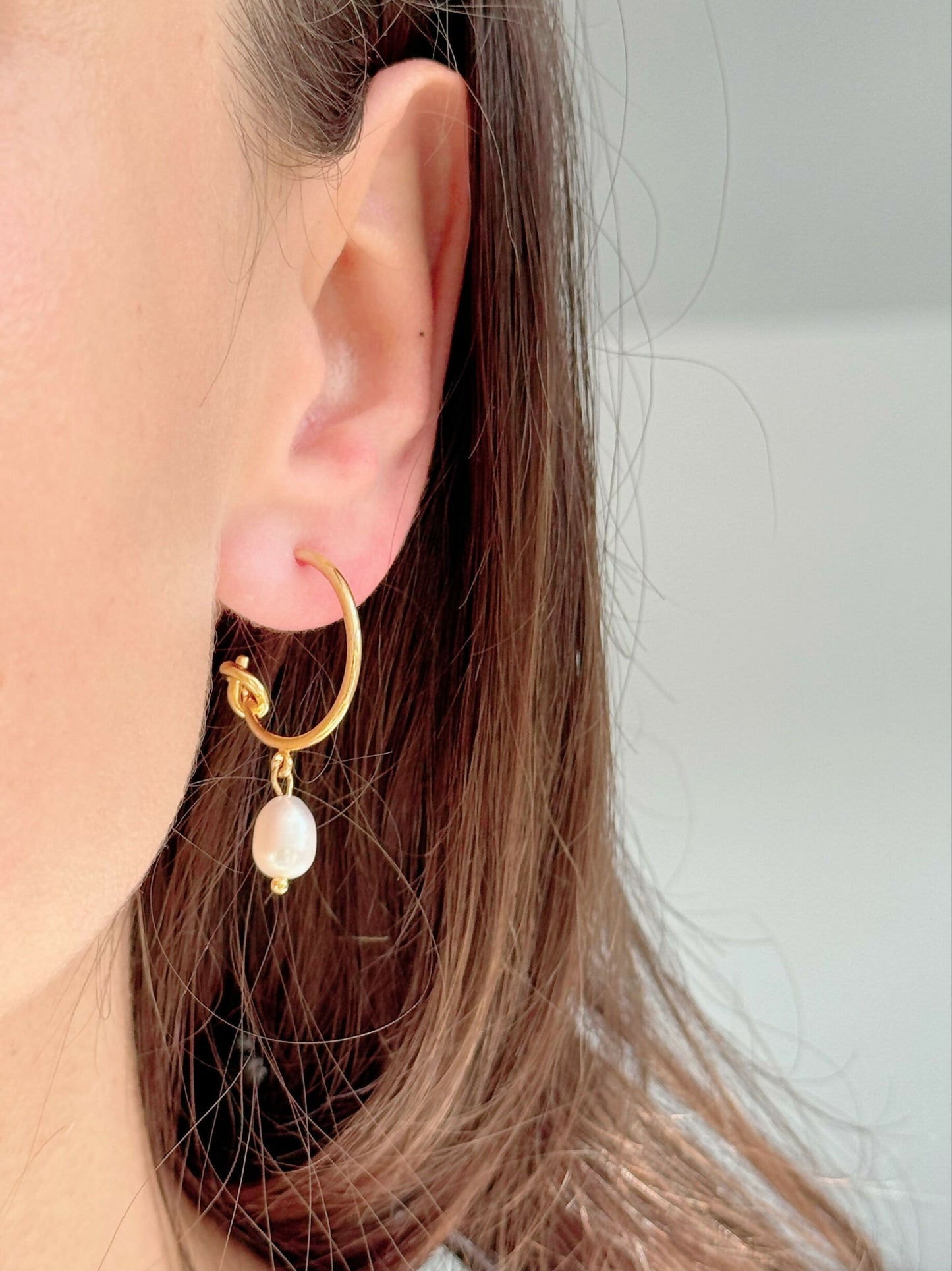 Coquette Pearl Drop Hoop Earrings In Gold Tone