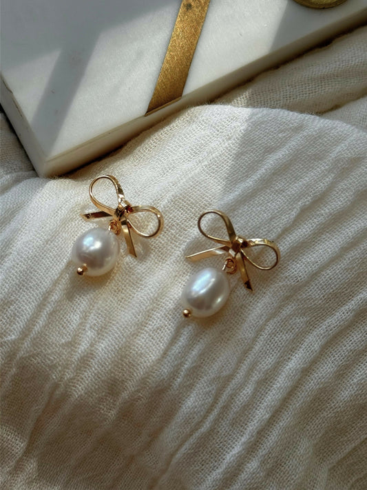 Pearl Drop Bow Earrings in gold shade