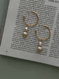 Pearl drop medium hoop earrings in gold tone